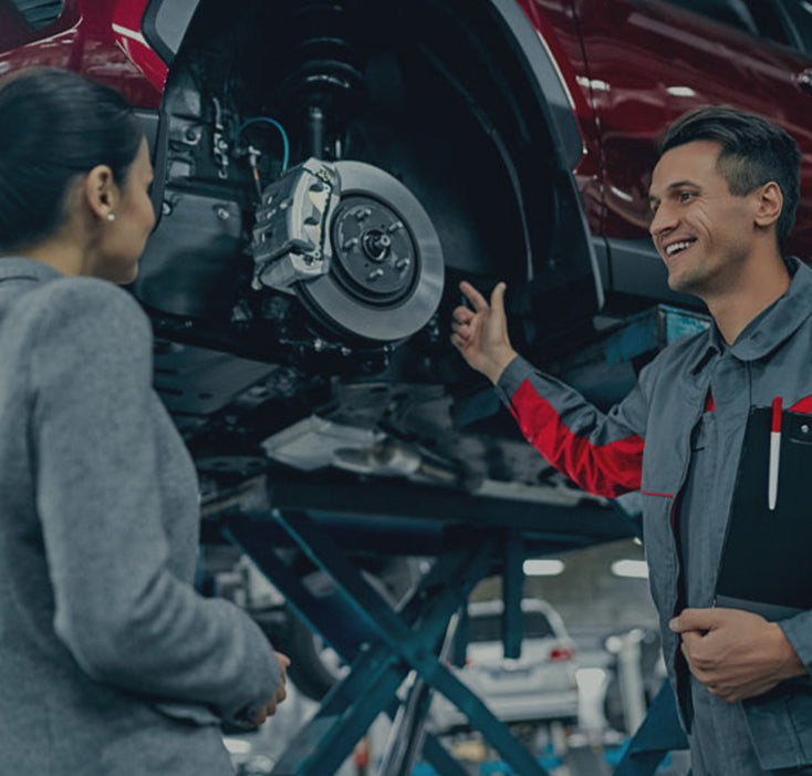 people working on car