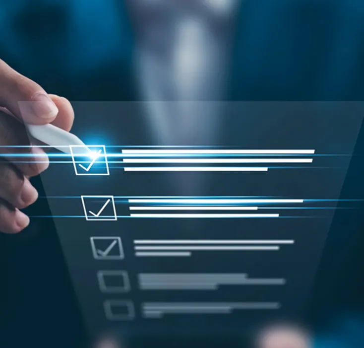 Hand with pen pointing at checkboxes graphic