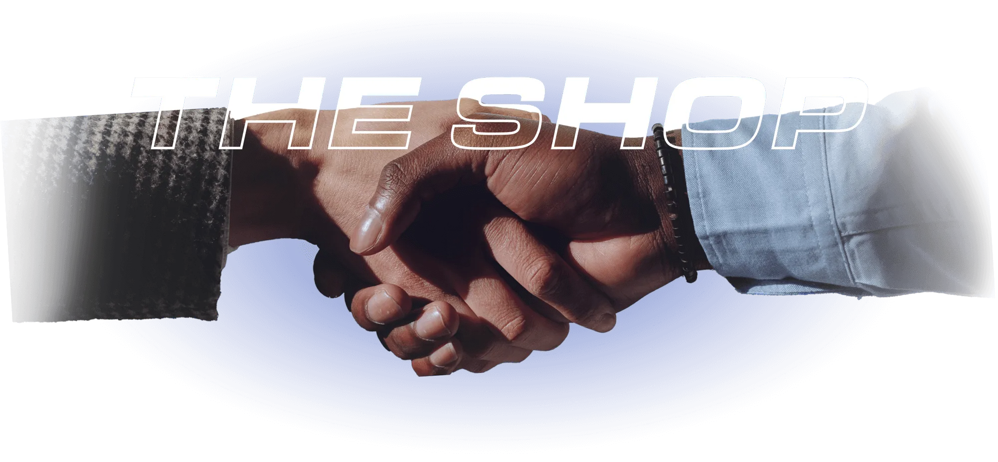 The Shop Logo with hands shaking